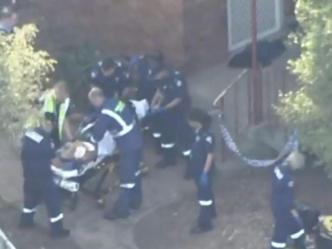 A video grab shows paramedics attending to one of the victims. Picture: 7News