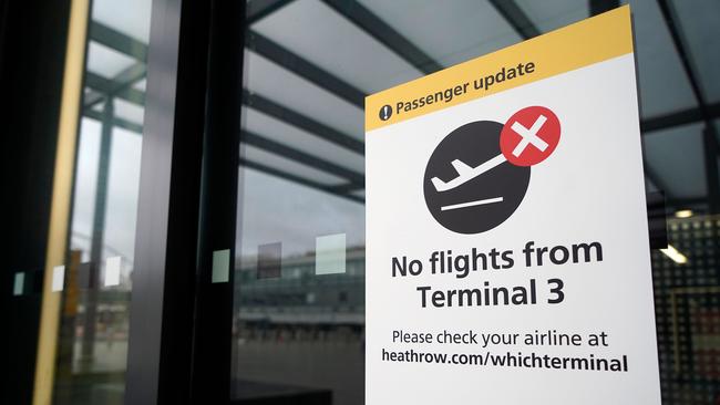 A sign alerts travellers to the closure of Terminal 3 at Heathrow Airport in London. Picture: AFP