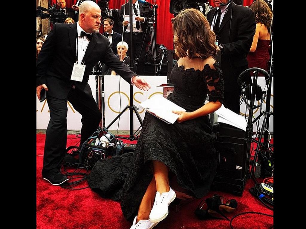 Lisa Wilkinson at the Oscars 2015 via Instagram, “Sometimes at the #Oscars, you just gotta take a load off...”