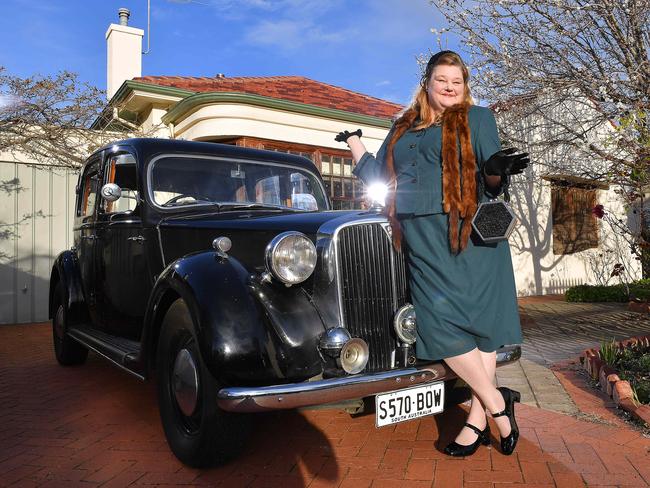 Roxann Legg with her Rover P3 75 Four Door Saloon with sunroof in her driveway at Plympton that she will driving in this years Bay to Birdwood dressed in her own designed 1940's vintage clothing .Monday August 24,2020.Picture Mark Brake