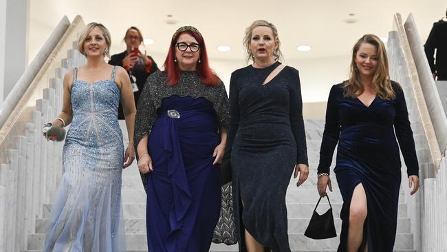 Liberal MPs Melissa McIntosh, Melissa Price, Sussan Ley and Zoe McKenzie make an entrance. Picture: NCA NewsWire / Martin Ollman