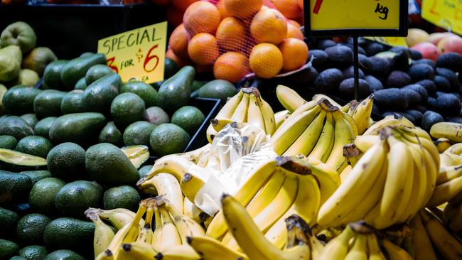 A single-use plastic bag lies discarded on top of bananas at the Central Market. Picture: AAP / Morgan Sette