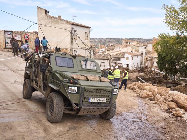 An emergency vehicle passes the scene of damage after flash floods in Letur, Albacete province. Picture: Getty Images