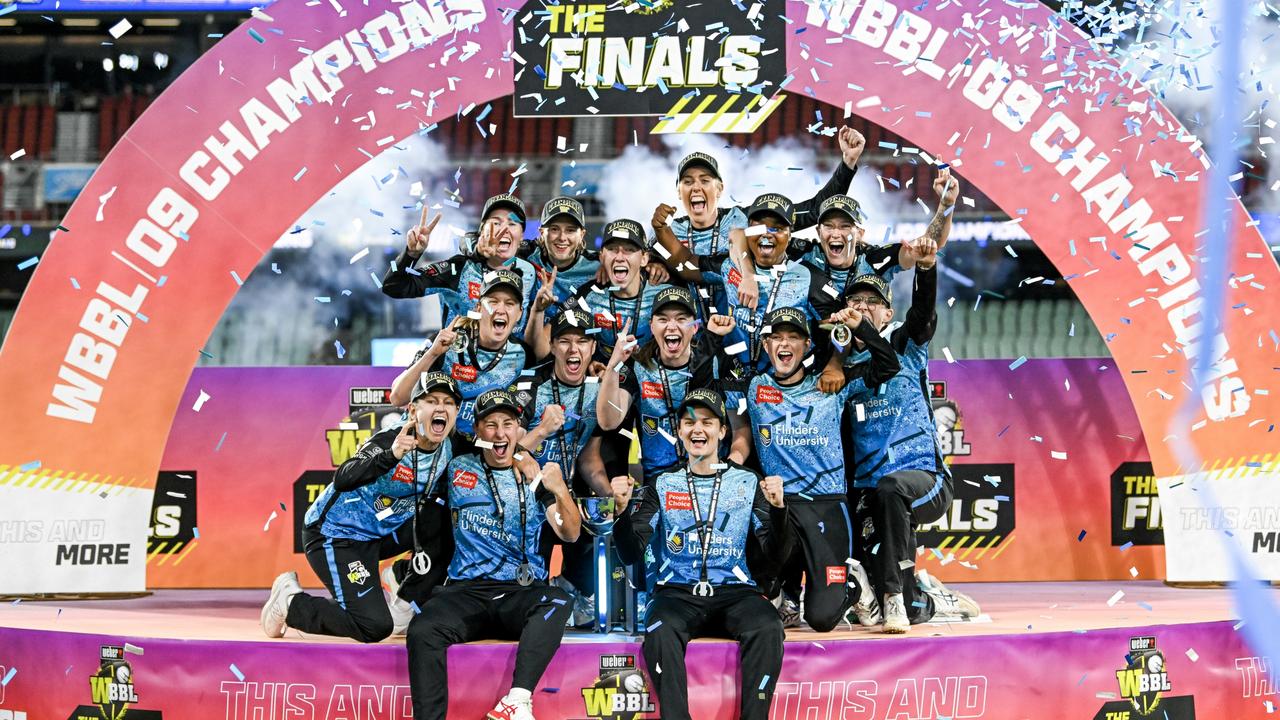 The Strikers celebrate on the podium after winning the WBBL Final. Photo by Mark Brake – CA/Cricket Australia via Getty Images