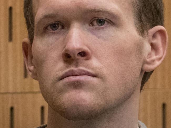 CHRISTCHURCH, NEW ZEALAND - AUGUST 27: Christchurch mosque gunman Brenton Tarrant listens as Crown prosecutor Mark Zarifeh deliveries his submission during his sentencing hearing at Christchurch High Court on August 27, 2020 in Christchurch, New Zealand. Brenton Harrison Tarrant has been sentenced to life in prison without parole after being found guilty of 92 charges relating to New Zealand's worst mass shooting in history. The Australian was charged with 51 counts of murder and 40 of attempted murder as well as engaging in a Terrorist Act after opening fire at Al Noor Mosque and the Linwood Islamic Centre in Christchurch on Friday, 15 March 2019. 50 people were killed, and dozens were injured while another man died later in hospital. (Photo by John Kirk-Anderson - Pool/Getty Images)