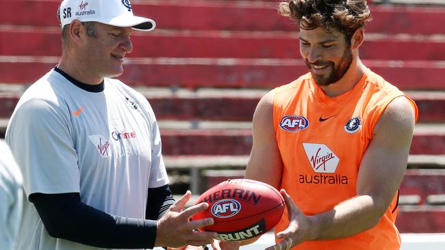 Levi Casboult gets advice from goalkicking coach Sav Rocca. Picture: Michael Klein