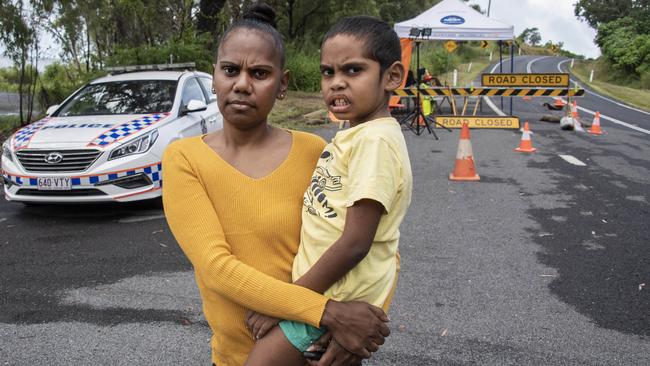 Keisha Dangar with son Drew at the Yarrabah roadblock. Picture: Brian Cassey