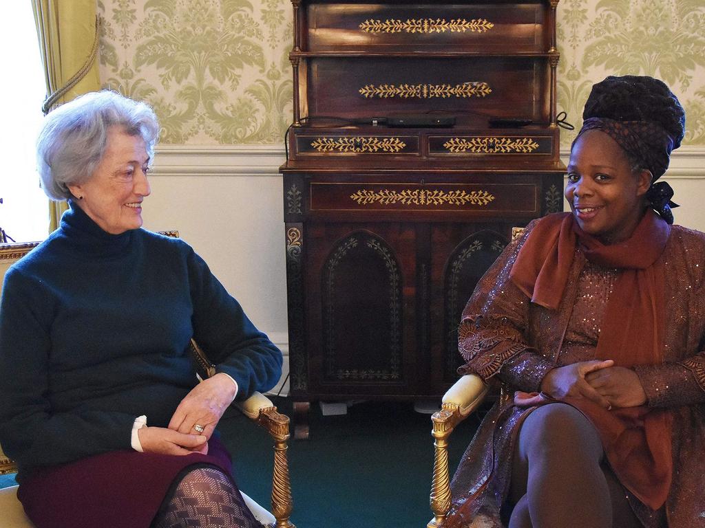 A handout released by Royal Communications shows Lady Susan Hussey and Ngozi Fulani, founder of Sistah Space, in the Regency room at Buckingham Palace on December 16. Picture: AFP/Buckingham Palace