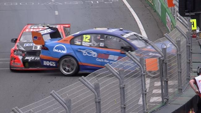 The moment of impact as Coulthard hits the concrete pit wall.