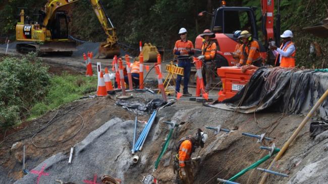 A work crew on Beechmont Rd in the Gold Coast Hinterland.