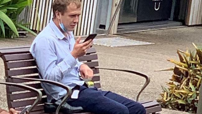 Thomas Pennal takes a seat outside Coffs Harbour Courthouse on the day he was sentenced for his involvement in a pub fight.