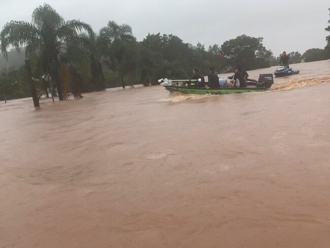 A rescue boat travels down Ballina St in South Lismore on February 28, 2022. Picture: Cath Piltz