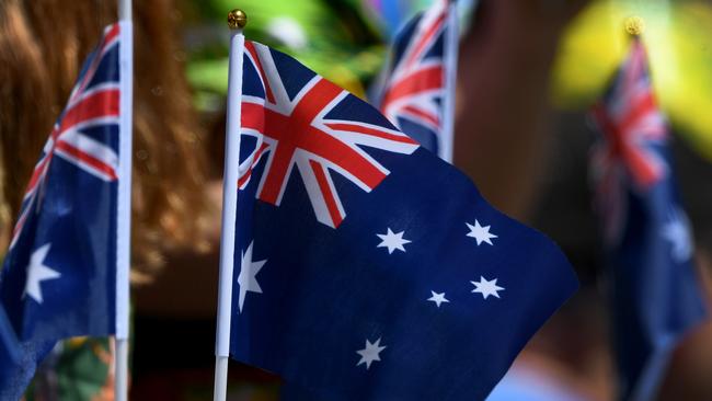 Fans with their flags during the First ODI of the 2018 Australia v England ODI Series at Melbourne Cricket Ground, Melbourne, Sunday, January 14, 2018. (AAP Image/Joe Castro) NO ARCHIVING, EDITORIAL USE ONLY, IMAGES TO BE USED FOR NEWS REPORTING PURPOSES ONLY, NO COMMERCIAL USE WHATSOEVER, NO USE IN BOOKS WITHOUT PRIOR WRITTEN CONSENT FROM AAPIMAGES TO BE USED FOR NEWS REPORTING PURPOSES ONLY, NO COMMERCIAL USE WHATSOEVER, NO USE IN BOOKS WITHOUT PRIOR WRITTEN CONSENT FROM AAP