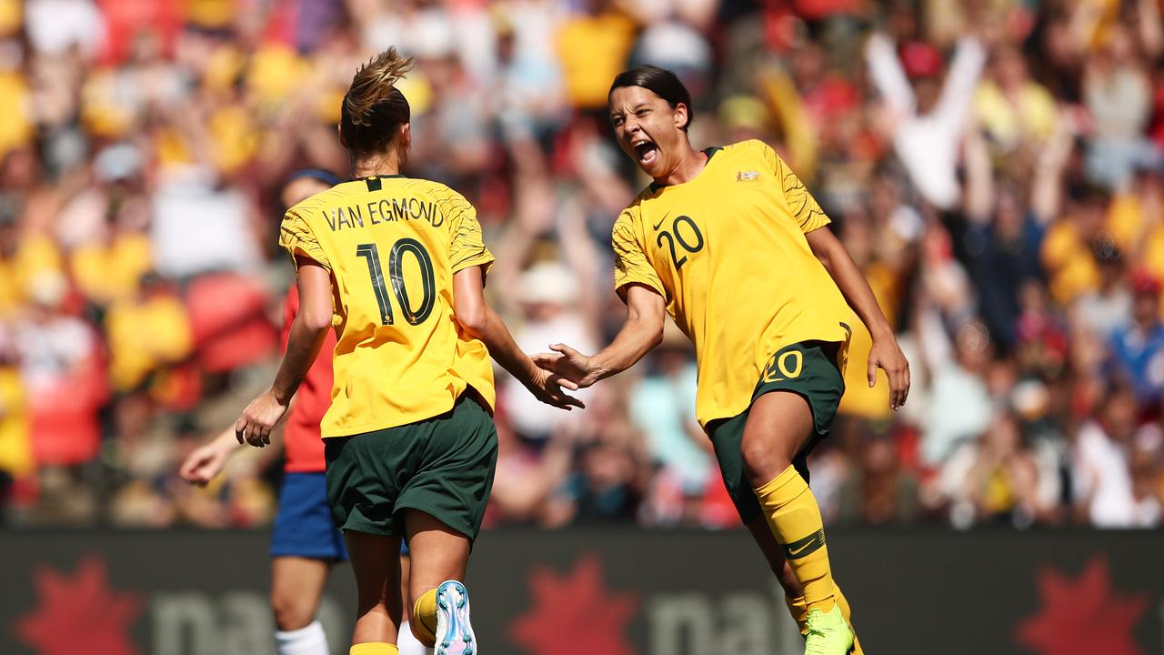 Emily van Egmond (L) of Australia celebrates with Samantha Kerr (R)