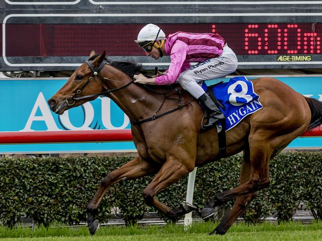 Race 2 at the  Gold Coast Turf Club on Saturday. Winning horse Hacksaw Ridge (white cap, pink top), ridden by Ryan Plumb.  Picture Jerad Williams