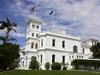 Government House secretary’s wife flew to UK with Governor’s party