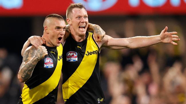 Dustin Martin and Jack Riewoldt celebrate the 2020 grand final win over Geelong.