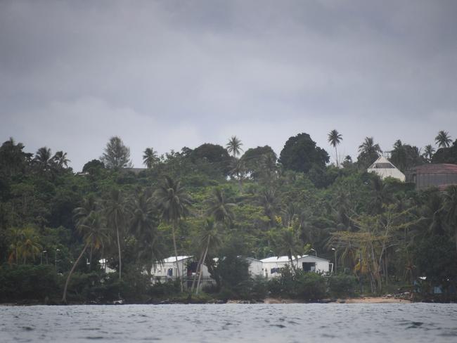 Storm clouds over the detention centre. Picture: Brian Cassey