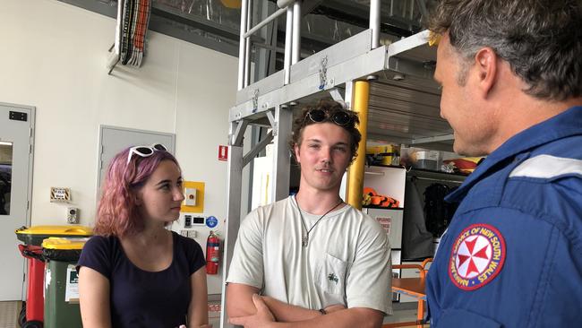 Beauyn Crew (middle) and his girlfriend Bre talking about Tuesday’s rescue with NSW Ambulance Critical Care Paramedic Jeremy Veness (right). Pic Amy Ziniak