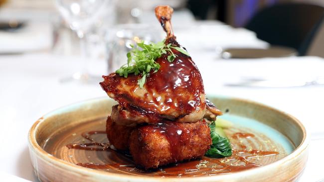 Main Wave’s twice cooked duck with steamed bokchoy and chive potato croquette and sweet chilli and plum glaze. Photo by Richard Gosling