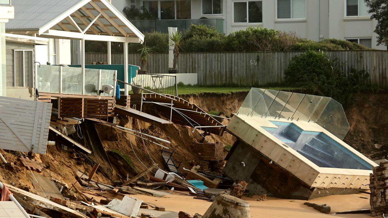 The image of Malcolm McGuiness’s pool collapsed on the beach went around the world. Picture: John Grainger