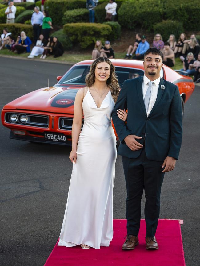 Lily Richmond and Abdullah Al-Halfi arrive at Harristown State High School formal at Highfields Cultural Centre, Friday, November 18, 2022. Picture: Kevin Farmer