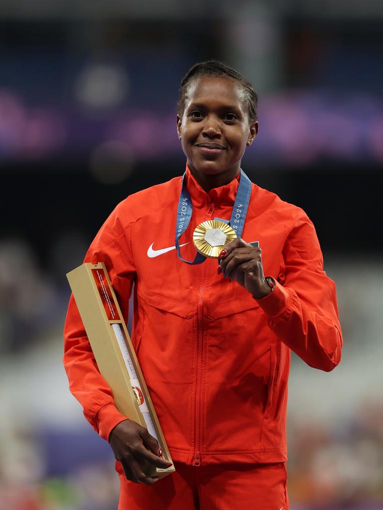 Faith Kipyegon claimed gold in the 1500m in Paris. Photo by Al Bello/Getty Images