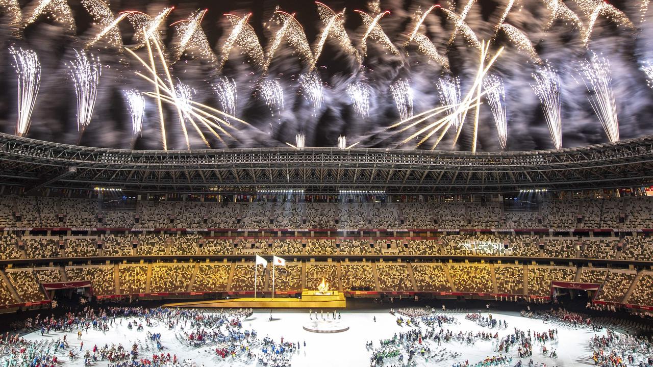 Fireworks light up the sky at the end of the opening ceremony for the Tokyo 2020 Paralympic Games at the Olympic Stadium.