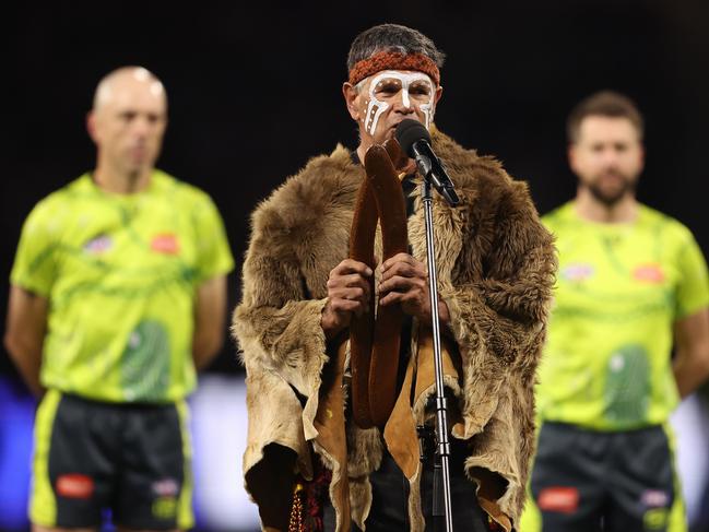 PERTH, AUSTRALIA - MAY 24: Dr Richard Walley performs the welcome to country during the round 11 AFL match between Walyalup (the Fremantle Dockers) and Collingwood Magpies at Optus Stadium, on May 24, 2024, in Perth, Australia. (Photo by Paul Kane/Getty Images)