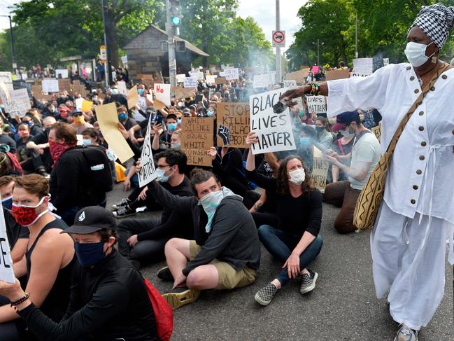 Incense is waved over protesters in Franklin Park in Boston, Massachusetts on Tuesday. Picture: Joseph Prezioso/AFP)