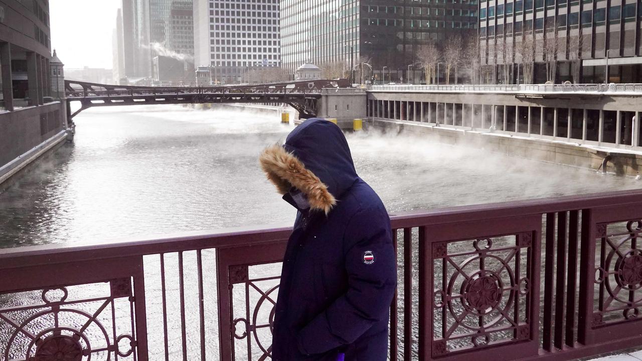 Vapour rises from the Chicago River as temperatures sink in the city. (Photo by SCOTT OLSON / GETTY IMAGES NORTH AMERICA / Getty Images via AFP)