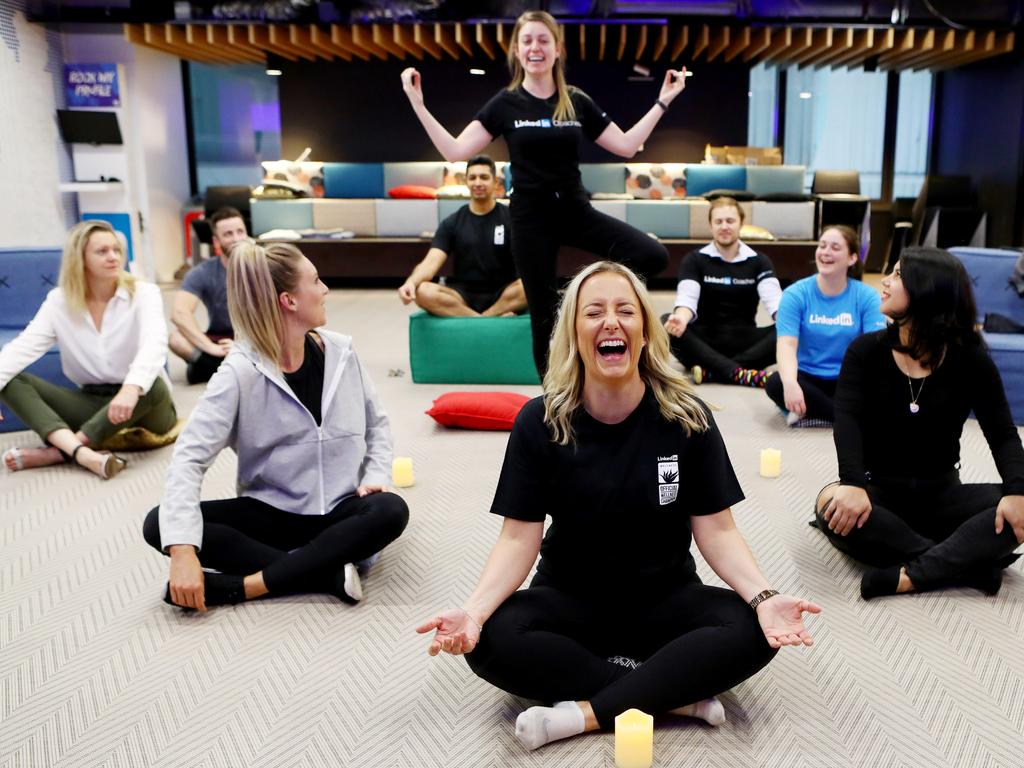 **EMBARGO FOR WEEKEND PROFESSIONAL**20/09/2018: Relationship manager Tracey Brown (C) leading LinkedIn Sydney's morning meditation class. Hollie Adams/The Australian