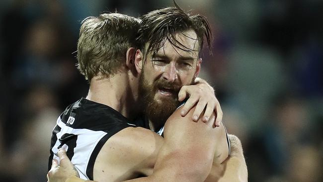 AFL - Port Adelaide v Fremantle at Adelaide Oval. Charlie Dixon hugs Todd Marshall after he kicked another goal. Picture SARAH REED