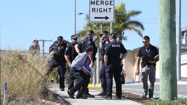Police investigate the crash. Picture Glenn Hampson