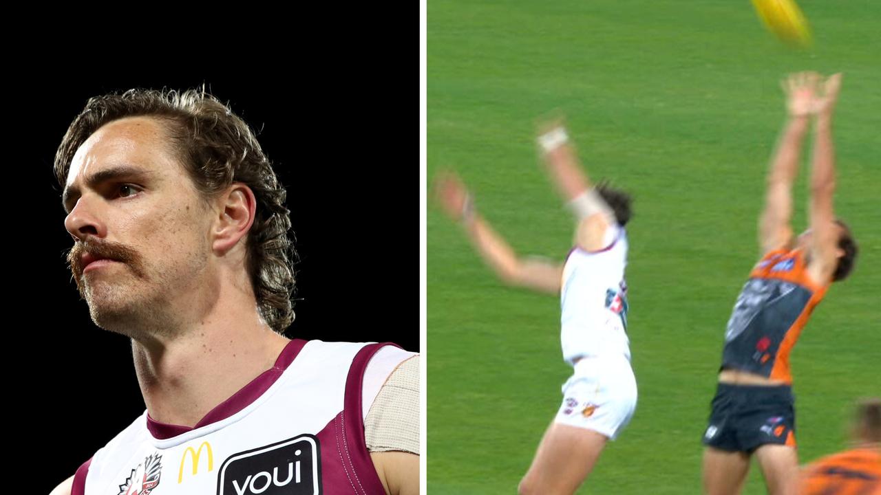 Joe Daniher / and  getting outmarked by Jack Buckley.
