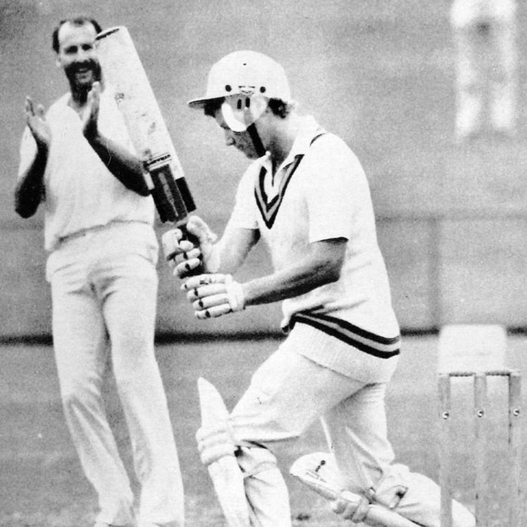 Dennis Lillee applauds as Kim Hughes misses a ball during grade cricket in Perth, 1987.