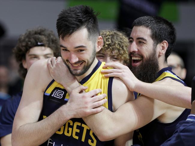 Jordan Hunt (L) and Jordan Ngatai of the Otago Nuggets celebrate victory in the NZ NBL Grand Final. (Photo by Dave Rowland/Getty Images)