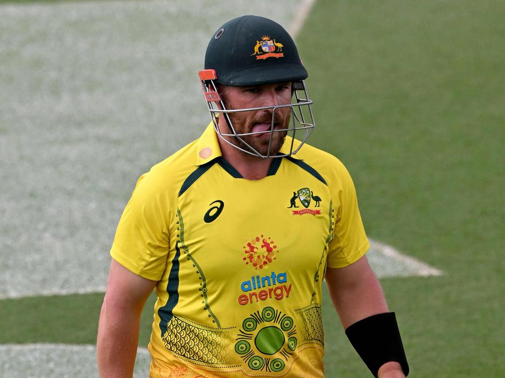 Australia's captain Aaron Finch walks off after been dismissed cheaply during the second one-day international (ODI) cricket match between Australia and Zimbabwe.
