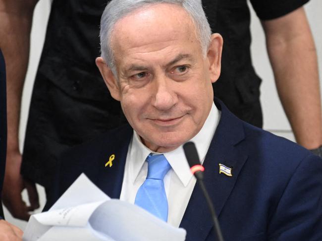 Israeli Prime Minister Benjamin Netanyahu attends his trial on corruption charges at the district court in Tel Aviv, on March 12, 2025. (Photo by Yair Sagi / POOL / AFP)