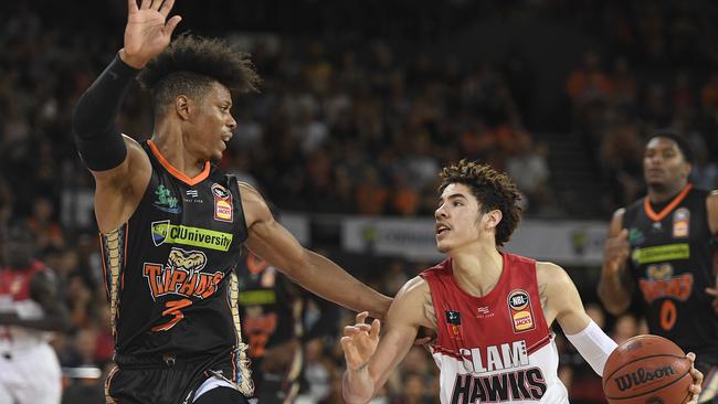 CAIRNS, AUSTRALIA – NOVEMBER 09: LaMelo Ball of the Hawks looks to get past Scott Machado of the Taipans during the round six NBL match between the Cairns Taipans and the Illawarra Hawks at the Cairns Convention Centre on November 09, 2019 in Cairns, Australia. (Photo by Ian Hitchcock/Getty Images)