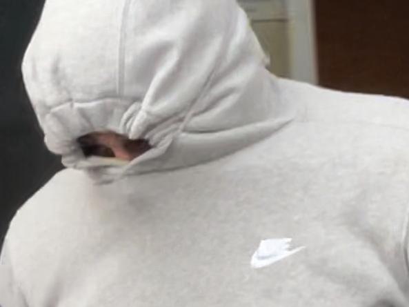 Joseph Wakim, 18, covered his face as he left Blacktown Local Court.