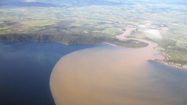 This file image of a flood plume from the Johnstone River gives an idea of the extent of sediment run-off that is possible during heavy rainfall events. Picture: GBRMPA