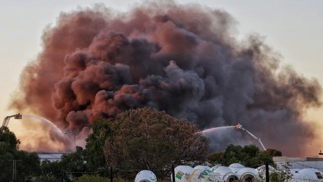 Smoke plumed into the sky. Picture: Hamish Blair