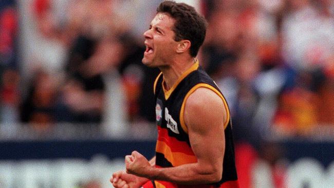 Troy Bond celebrates a goal during the Crows’ first premiership against St Kilda in 1997.