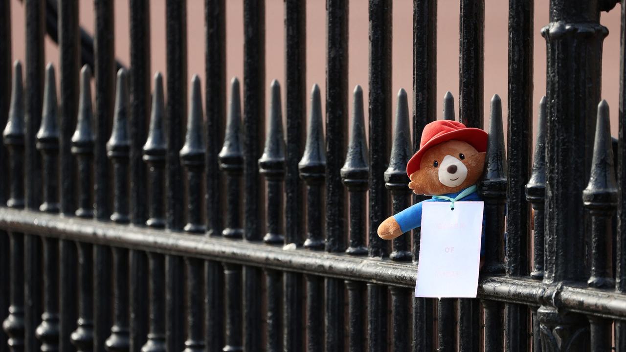 A Paddington teddy bear is pictured outside of Buckingham Palace in London. Picture: Adrian Dennis / AFP