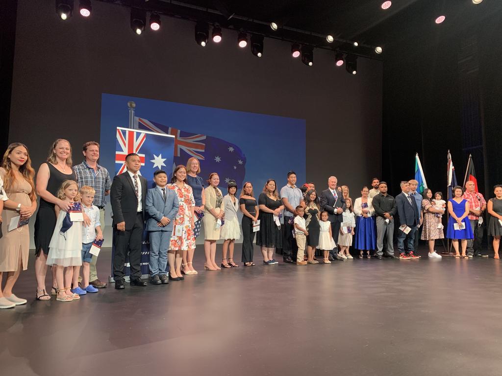 Our newest Australians gathered on the stage for the affirmation and oath at the MECC citizenship ceremony on Australia Day. Wednesday, January 26, 2022. Mackay Australia Day 2022. Mackay Citizenship Ceremony 2022. Picture: Duncan Evans