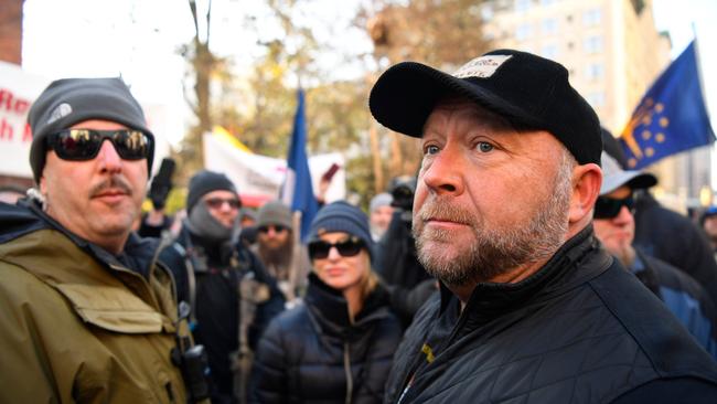 Radio host and far-right conspiracy theorist Alex Jones joins gun rights advocates and militia members in Virginia's capital on Jan. 20, 2020. Picture: Jack Gruber / Reuters