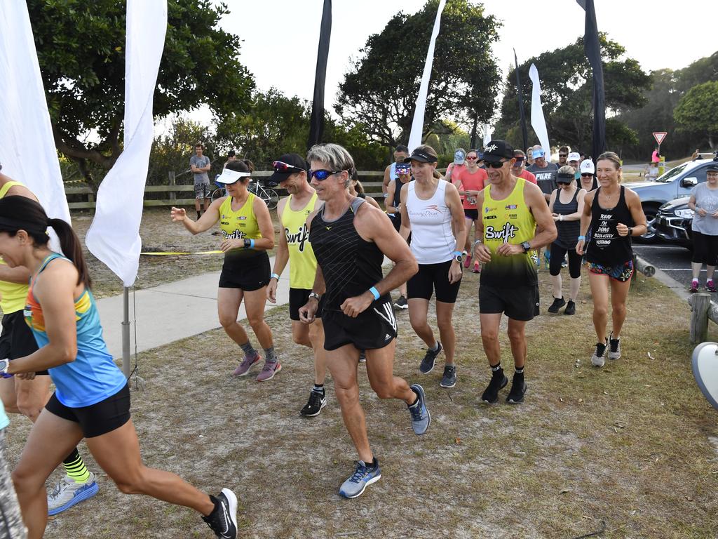 Competitors take off from the Whiting Beach start of the Yamba Triathlon Fun Run on Saturday morning.