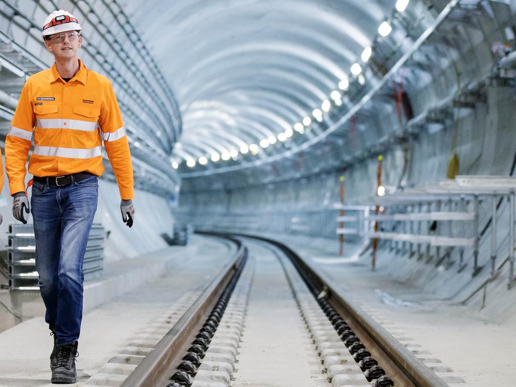 Transport Minister Mark Bailey inspect works underway deep inside the Cross River Rail tunnels. Picture Lachie Millard