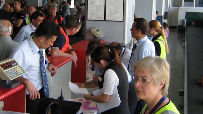 Australian staff deal with evacuees during Operation Ramp in 2006.